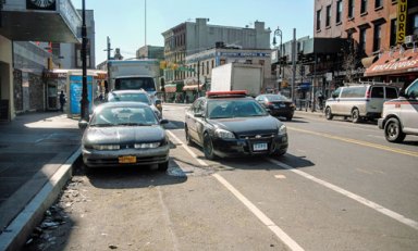 Double perk-ing! Cop blocks Greenpoint bike lane for a pick-me-up