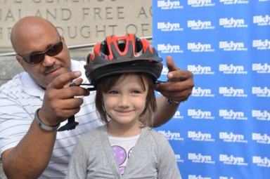 On your head and on the house: Library giving away free helmets