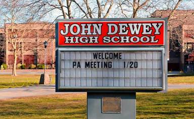 John Dewey principal fired over grade-fixing report