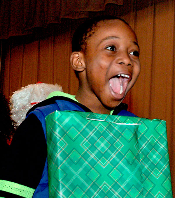 Santa brings toys to Flatbush school