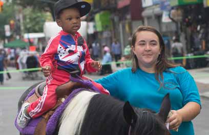 Horsing around! Kids go crazy for pony rides at Flatbush fair