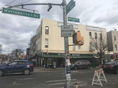 Cyclist dies after tractor-trailer operator drives over him on Williamsburg street, cops say