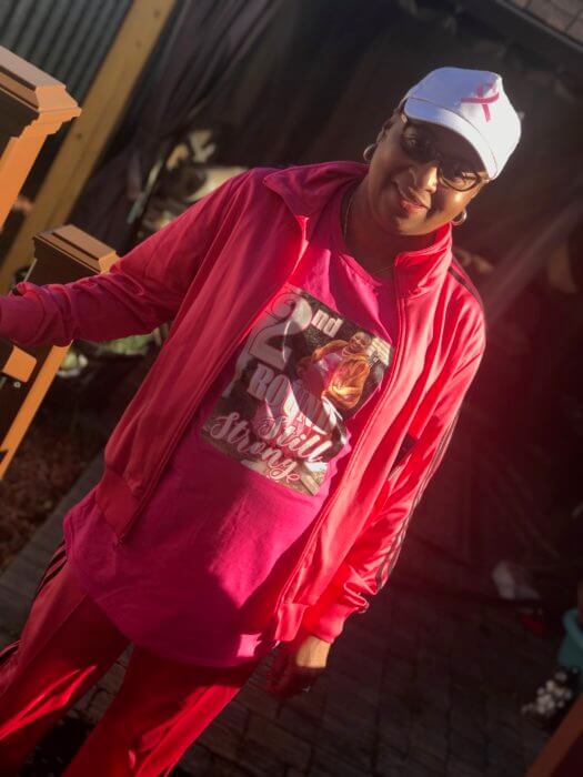 picture of breast cancer survivor doris taylor in an all-pink outfit
