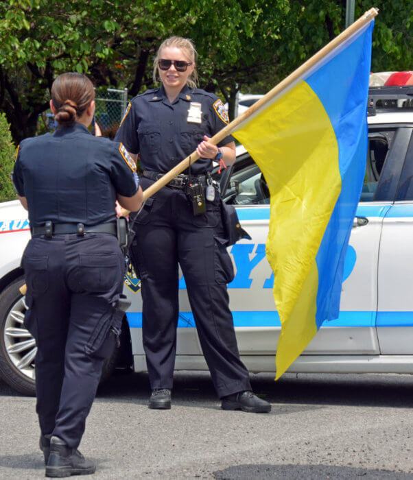 police officer with ukrainian flag at bayfest