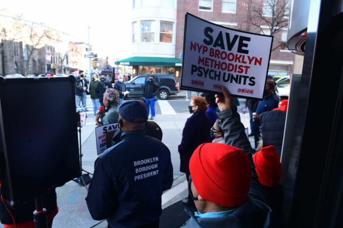 people rally for mental health services