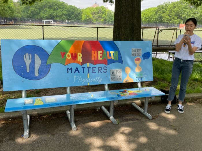 Artists talks about her students bench mural