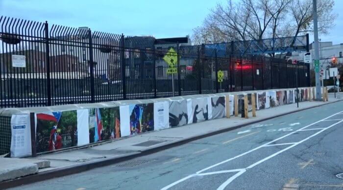 photo banners on red hook flood wall