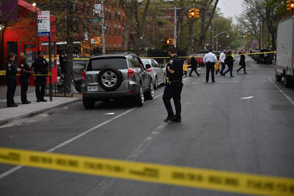 A 36-year-old man was shot in the head inside of a parked vehicle in Crown Heights.