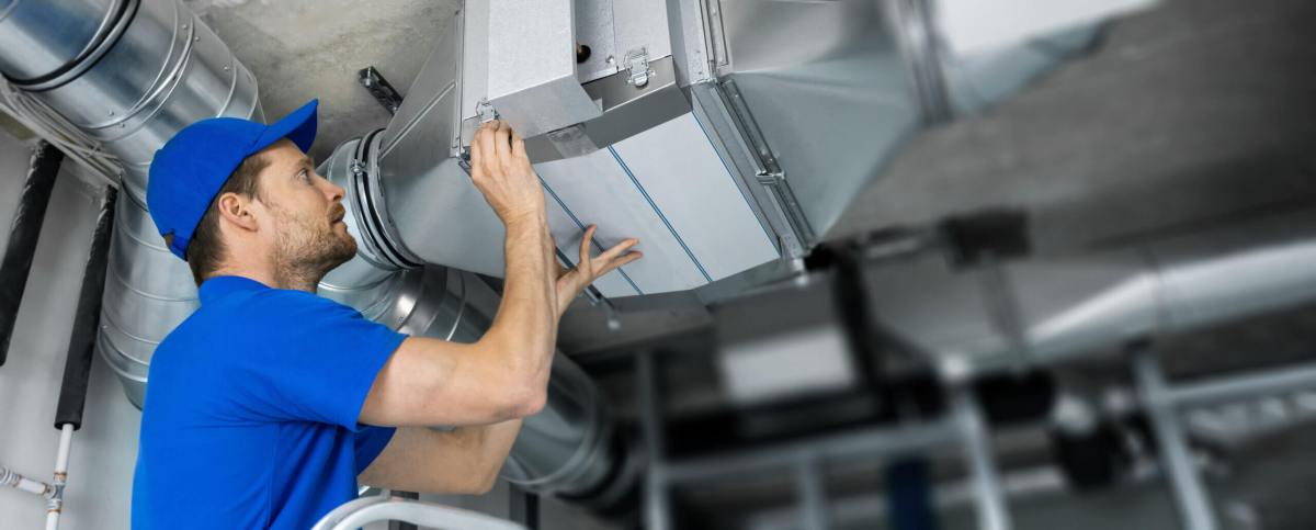 man working on HVAC