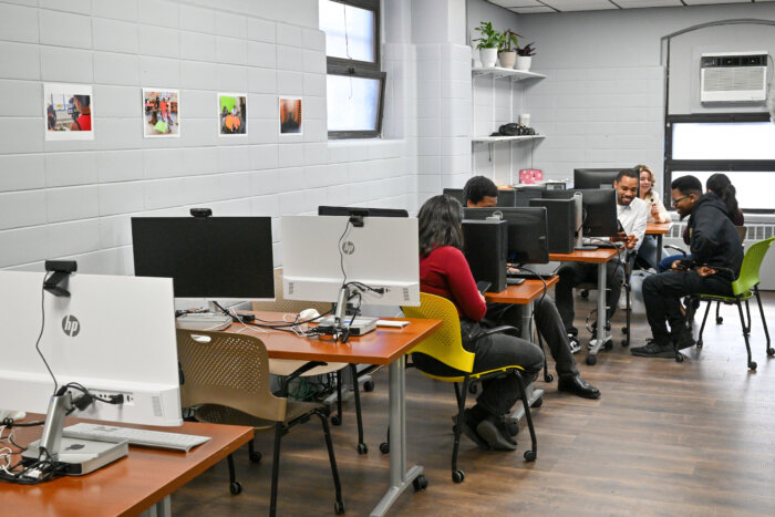 people use computers at red hook recreation center media lab