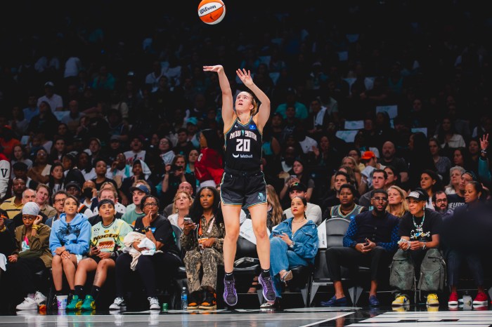 Sabrina Ionescu shoots her shot against the Indiana Fever. The player told Brooklyn Paper over 30 family members came out to watch her in this season's home debut.